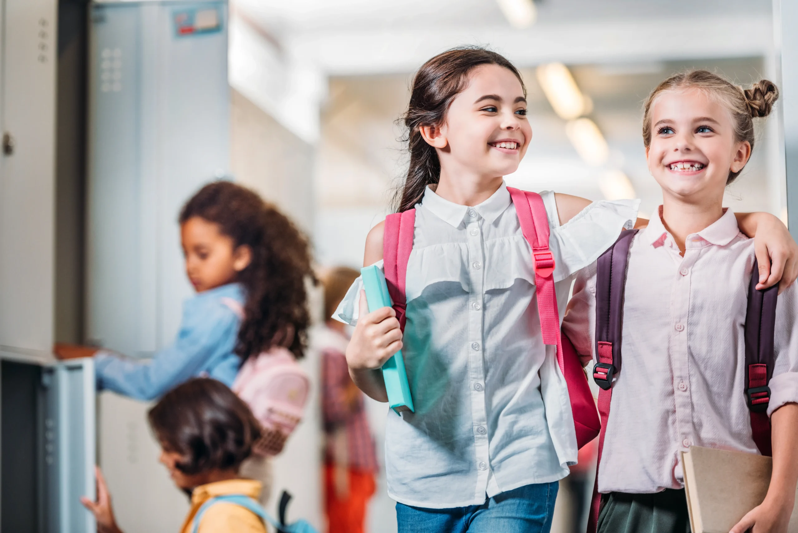 adorable-little-schoolgirls-walking-through-school-2026-01-06-00-40-46-utc
